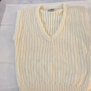 Cream colored large vest for the winter